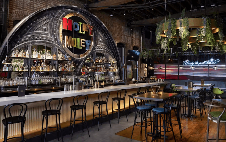 a bar with a sign that says holly noley